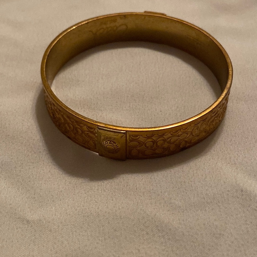 Gold toned Coach bracelet
